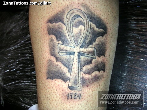 a cross with clouds tattoo on forearmTikTok Search